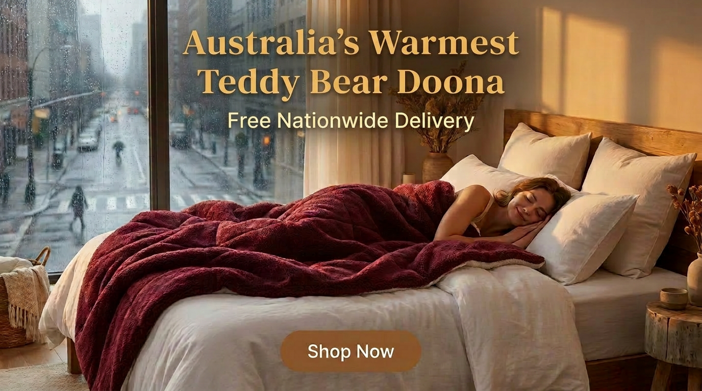 Australia's Warmest Teddy Bear Doona lifestyle shot with woman sleeping warmly in bed
