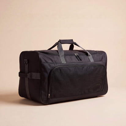Black duffel bag on a beige background