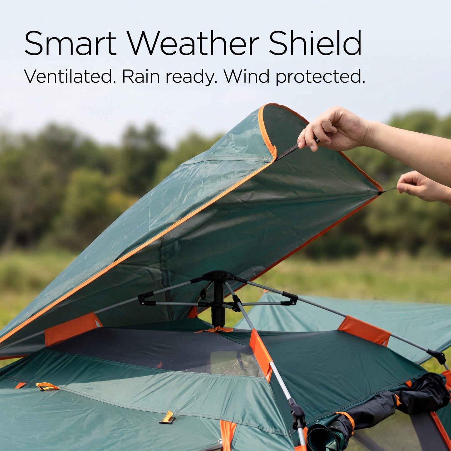 Smart Weather Shield being attached to a tent with a scenic background