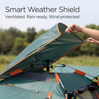 Smart Weather Shield being attached to a tent with a scenic background