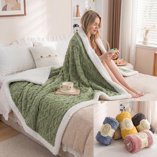 Woman relaxing on bed wrapped in a soft fleece blanket throw reading a book in a cosy Australian home
