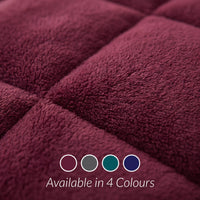Close-up of a textured purple fabric with color swatches below.
